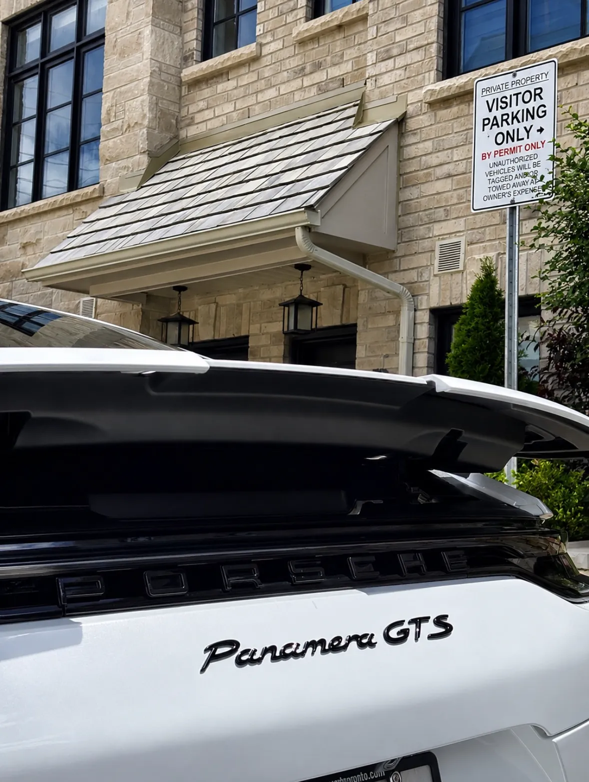 Panamera badge on clean paint after an exterior detail
