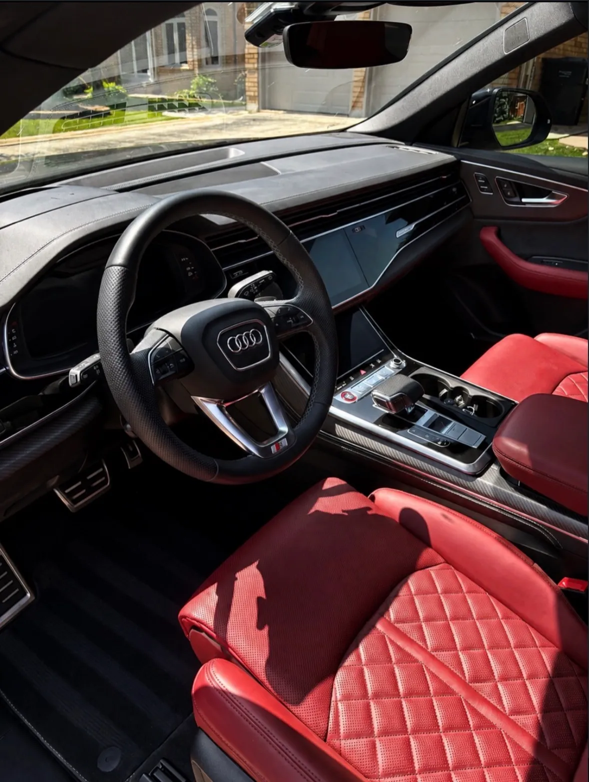 Audi SQ8 red diamond-stitched leather interior after a full interior detail